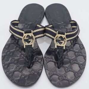 Gucci Black Leather Thong Sandals with Gold Interlocking GG
